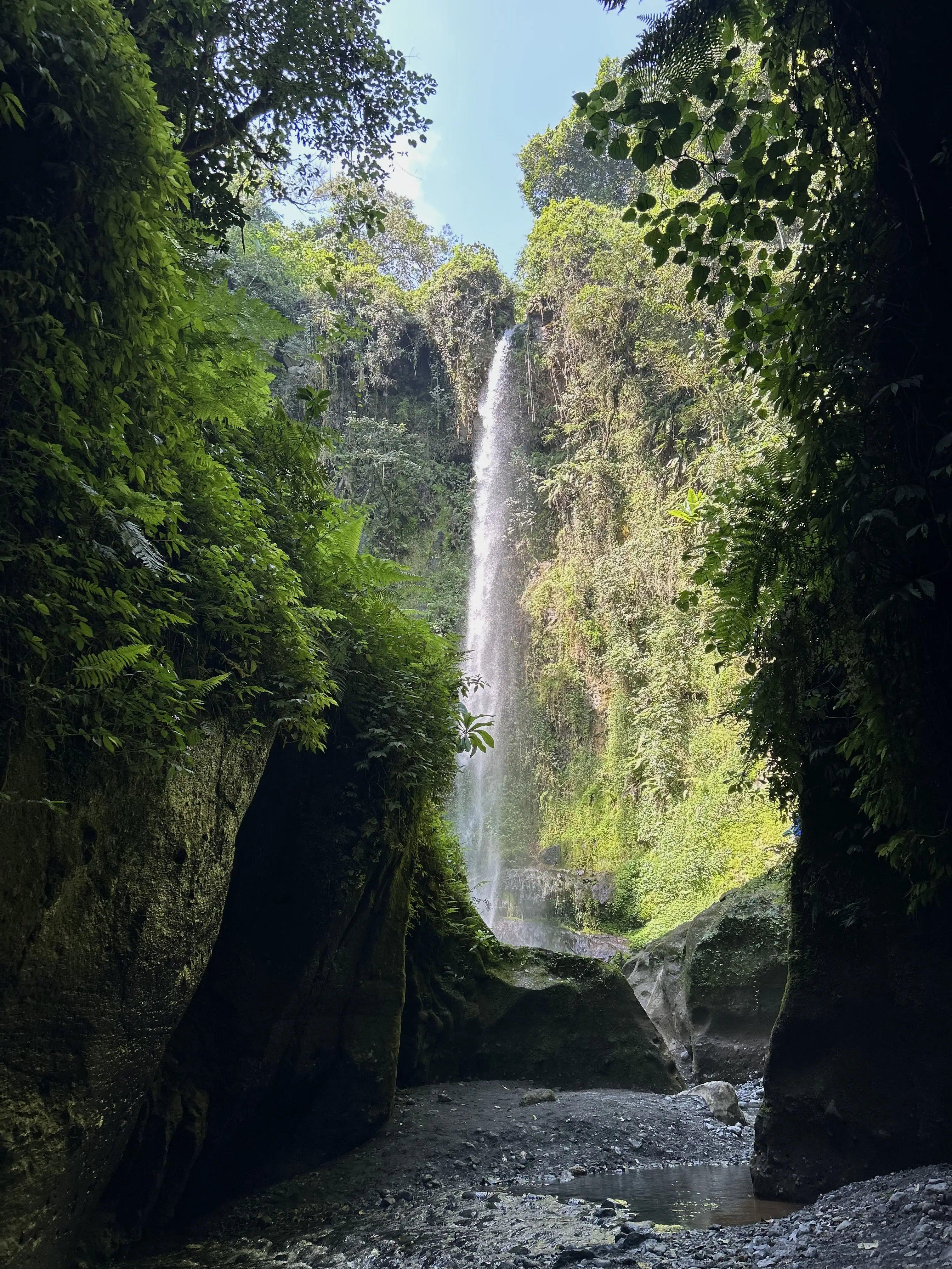Napuru waterfall dropping in a long white ribbon into a deep green gorge